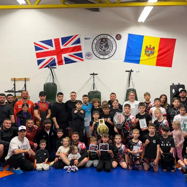 Our whole team at the grand opening, under the UK and Moldovan flags