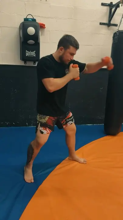 Shadow boxing on the wrestling mat