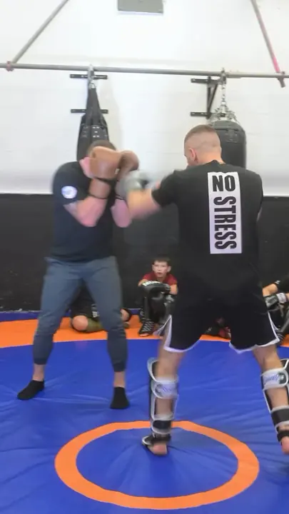 Adults sparring on our mat