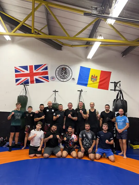Our team under the Union Jack and the Moldovan flag